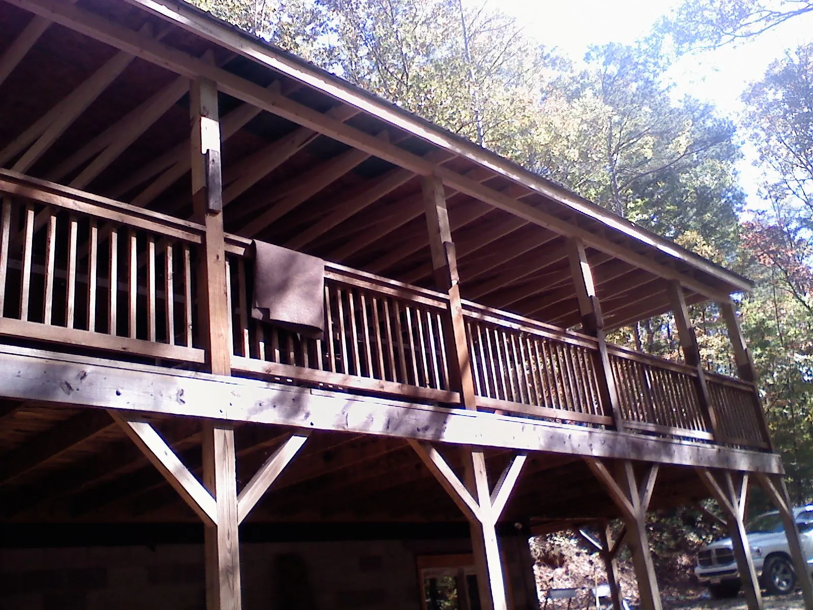 Timber framing under a new elevated porch and deck — Roof Leak Repair in Ellsworth by Roofing Brothers